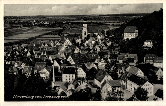 Ak Herrenberg in Württemberg, Luftaufnahme von  viele Häuser, Kirche, ländliche Umgebung