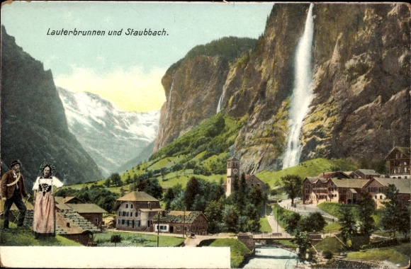 KP Lauterbrunnen Kanton Berno, krajobraz z wodospadem, górami, domami, ludźmi w tradycyjnych strojach
