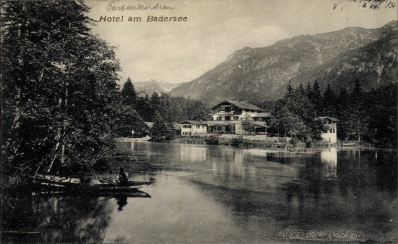 Postcard Grainau in Upper Bavaria, Badersee, hotel on the mountain, forest, boat, calm waters