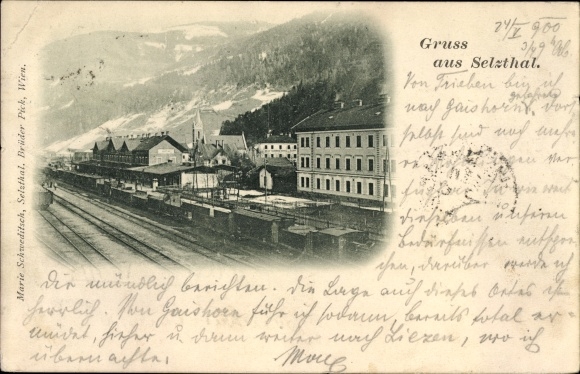 Postcard Selzthal Styria, train station with freight wagons, partial view of the city, church
