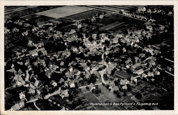 Postcard Holzhausen Bad Pyrmont in Lower Saxony, aerial view of Holzhausen, numerous roofs, clear