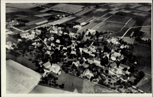 Postcard Hermsdorf am Wilisch Glashütte in Saxony, aerial view of many houses, rural surroundings