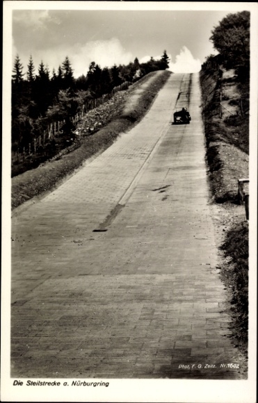 Postcard Nürburg in the Eifel, steep track at the Nürburgring, Nordschleife, racing cars
