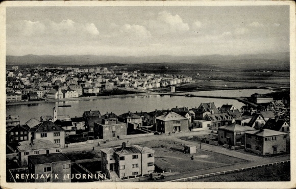 KP Reykjavík Islandia, widok z portu, domy, chmury