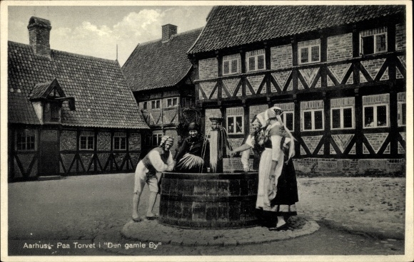 Postcard Århus Aarhus Denmark, people in traditional costumes at the fountain
