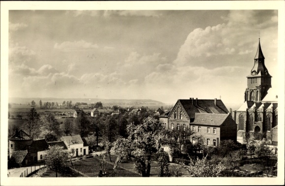 Postcard Kranenburg on the Lower Rhine, landscape photograph, church, buildings, trees, clouds