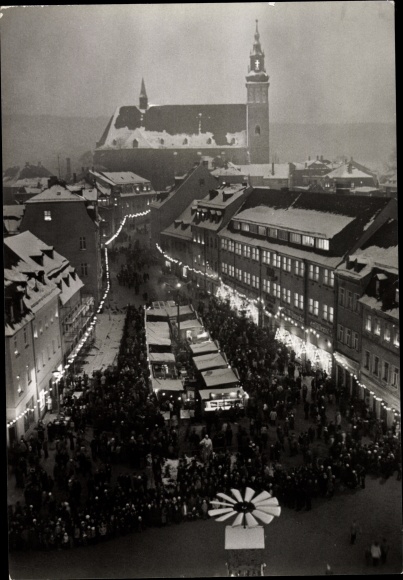 Postcard Schneeberg in the Ore Mountains, Christmas market at night, church