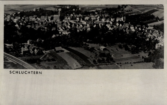 Postcard Schlüchtern in Hesse, aerial view of historical view, houses, fields