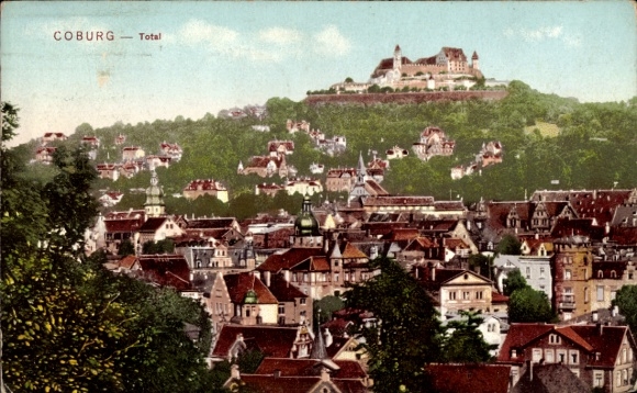 Postcard Coburg in Upper Franconia, city view of castle in the background, green hills