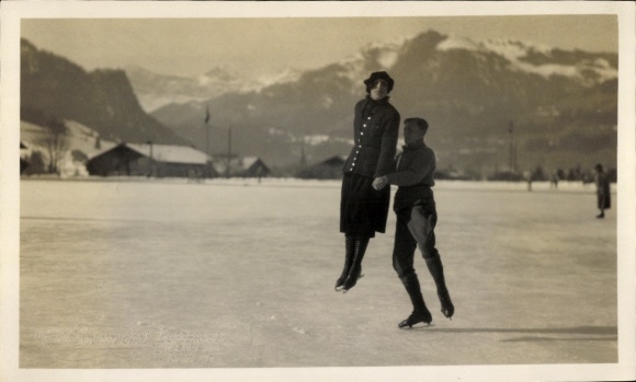 Photo Postcard Couple figure skating on a frozen lake
