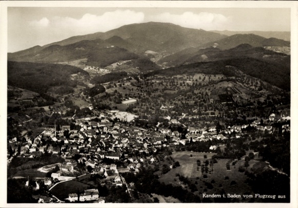 Postcard Kandern in the Black Forest Baden, aerial view of mountains in the background, city view