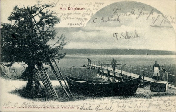 Postcard Ostseebad Kölpinsee on Usedom, At the boat on the jetty, people at the water, tree on the left, signature...