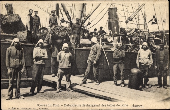 Ak Antwerpen Anvers Flandern, Debardeurs dechargeant des balles de laine, Schiff, Hafen