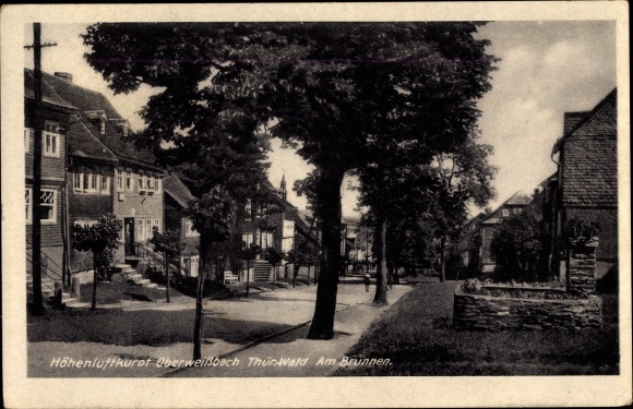 PC Oberweißbach im Weißbachtal Thuringia, at the fountain