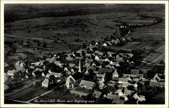 Postcard Hartheim am Rhein, aerial view of Hartheim, village surroundings, church, fields