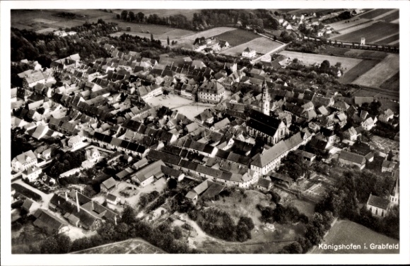 Postcard Bad Königshofen in Grabfeld Lower Franconia, aerial view of Königshofen, many roofs, church s