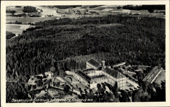 Postcard Kohlbruck Passau in Lower Bavaria, aerial view of the Sanatorium Kohlbruck, surrounded by forests, rocks