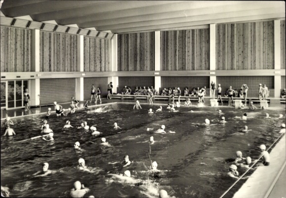Postcard Ostseebad Kühlungsborn, swimming pool, many children and adults in the water, wood paneling
