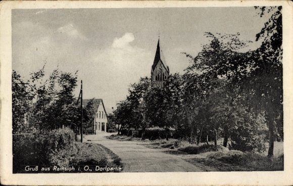 Postcard Ramsloh in Oldenburg Saterland, village street, church