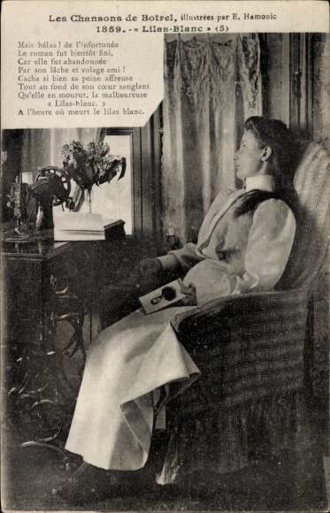 Postcard Woman in armchair with sewing machine
