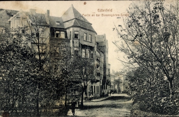 Postcard Bitterfeld in Saxony-Anhalt, city view trees, old architecture, shady street