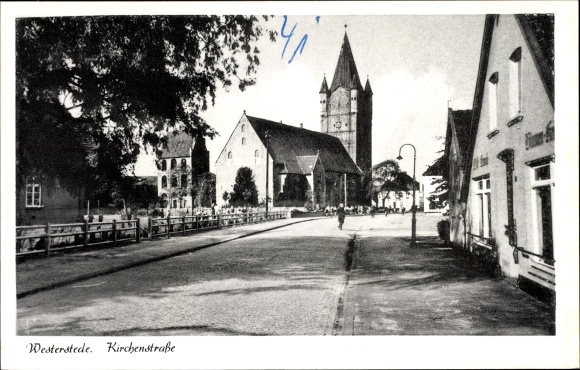 Postcard Westerstede in the district of Ammerland, Kirchenstrasse, church, bell tower