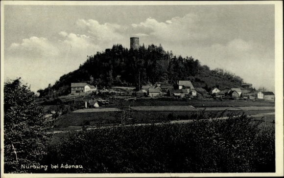 Postcard Nürburg in the Eifel, Nürburg on a hill, houses in the foreground, wooded landscape