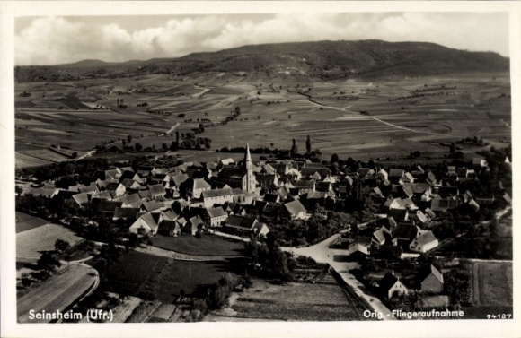 Postcard Seinsheim in Lower Franconia, aerial view of Seinsheim, village with church and surrounding fields