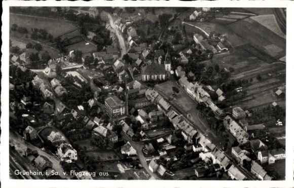 Postcard Grünhain in the Ore Mountains Saxony, aerial view of the village