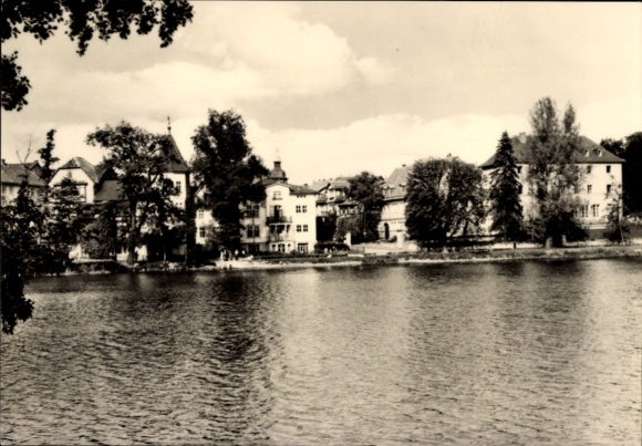 Postcard Bad Salzungen in Thuringia, beautiful view of buildings on the water, renovated houses, riverside trees