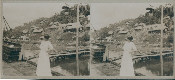 Stereo photo Guyana, woman with parrot on her hand, village party, boat dock