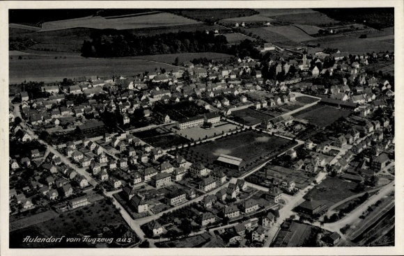 Postcard Aulendorf in Württemberg, aerial view of townscape, houses, fields