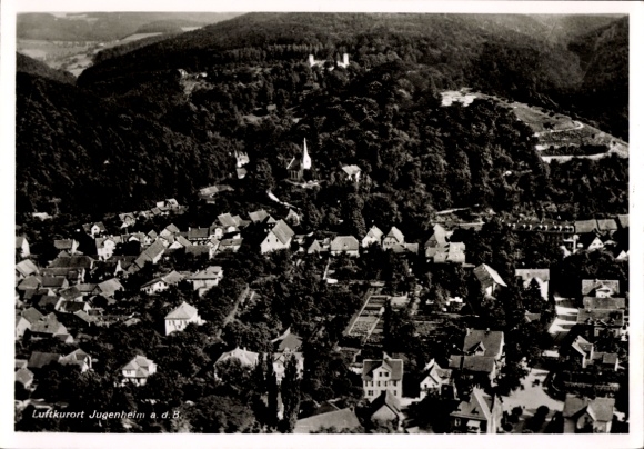 Ak Jugenheim an der Bergstraße Hessen, Luftaufnahme, dichte Wälder, Häuser und Kirchen sichtbar