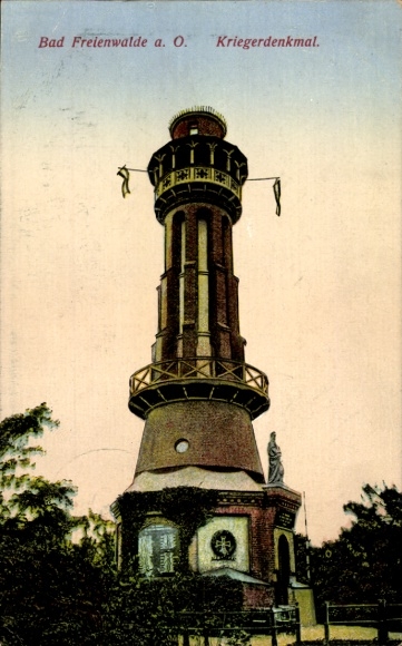 PC Bad Freienwalde an der Oder, war memorial, high tower, trees in the foreground
