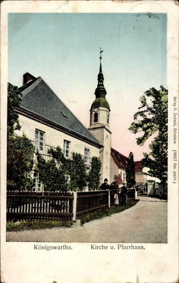 Ak Königswartha in Oberlausitz, kerk, pastorie, architectuur, prachtige kleuren