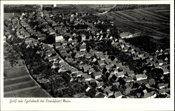 Postcard Egelsbach in Hesse, aerial view of Egelsbach, many roofs, fields, church