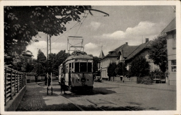 Ak Tabarz im Thüringer Wald, Waldbahnhaltestelle, Straßenbahn, Bäume, Häuser, sonniger Tag