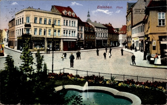 Postcard Lutherstadt Eisleben, city view, CIGARS, plan, buildings, people on the street