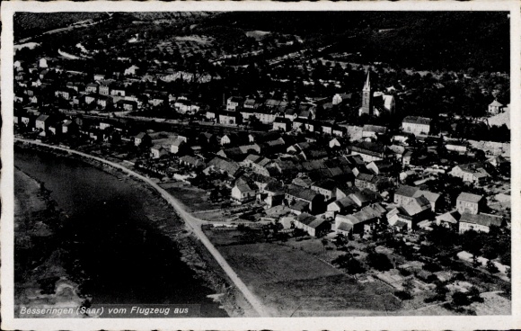 Postcard Besseringen Merzig Saar, aerial view of Besseringen, church, houses, river