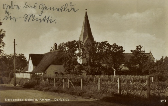Postcard fog on the island of Amrum North Frisia, village party, church