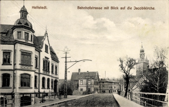 Ak Hettstedt im Südharz, Bahnhofstraße, Jacobikirche,  Architektur, alte 