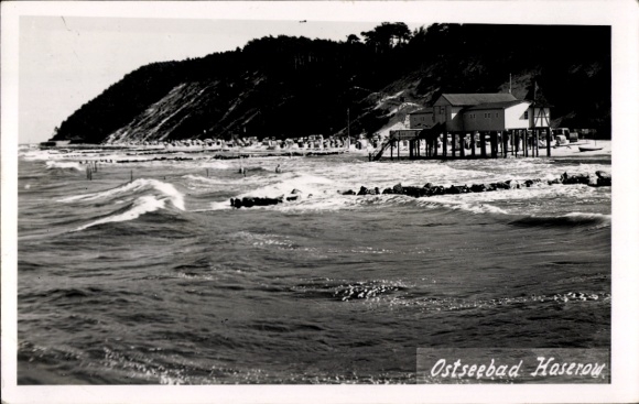 Postcard Ostseebad Ahlbeck on Usedom, waves hitting the shore, behind it a built-up slope