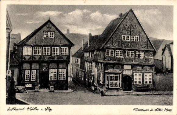 Postcard Mölln in the Duchy of Lauenburg, climatic health resort two half-timbered houses, museum, architecture