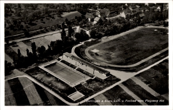 Postcard Dettingen an der Erms, aerial view of the outdoor pool and sports field, beautiful landscape photo
