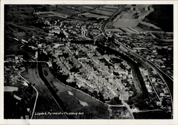 Postcard Lügde in the Weserbergland, aerial view of the town centre, landscape, river