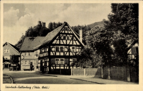 Postcard Steinbach Hallenberg in Thuringia, half-timbered house, settlement, street view
