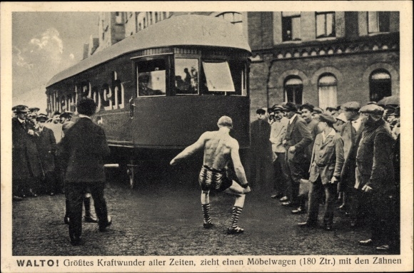 Postcard Walto, greatest powerhouse of all time, pulls moving vans with his teeth