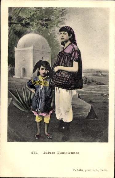 Glitter Judaika Postcard Jews from Tunisia, woman with child in traditional costume