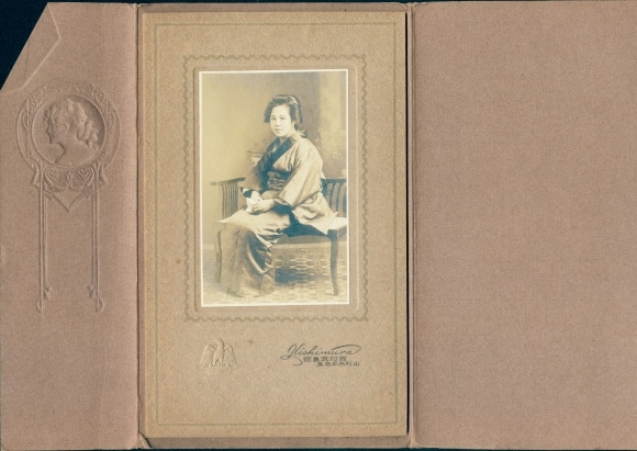 Cabinet Photo Yamagata Japan, Young Japanese woman in kimono on a bench, portrait