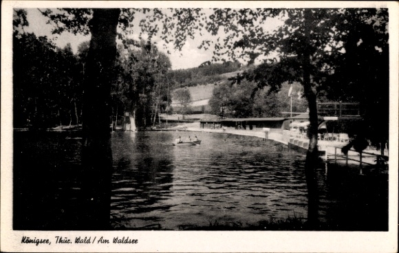 Postcard Königsee in Thuringia, view of the forest lake with boathouse and trees